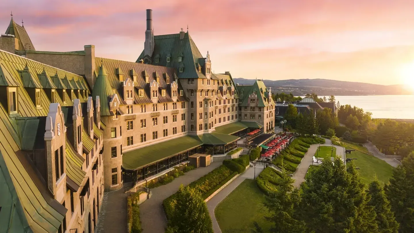Fairmont Le Manoir Richelieu, La Malbaie — the grand chalet facade at sunset
