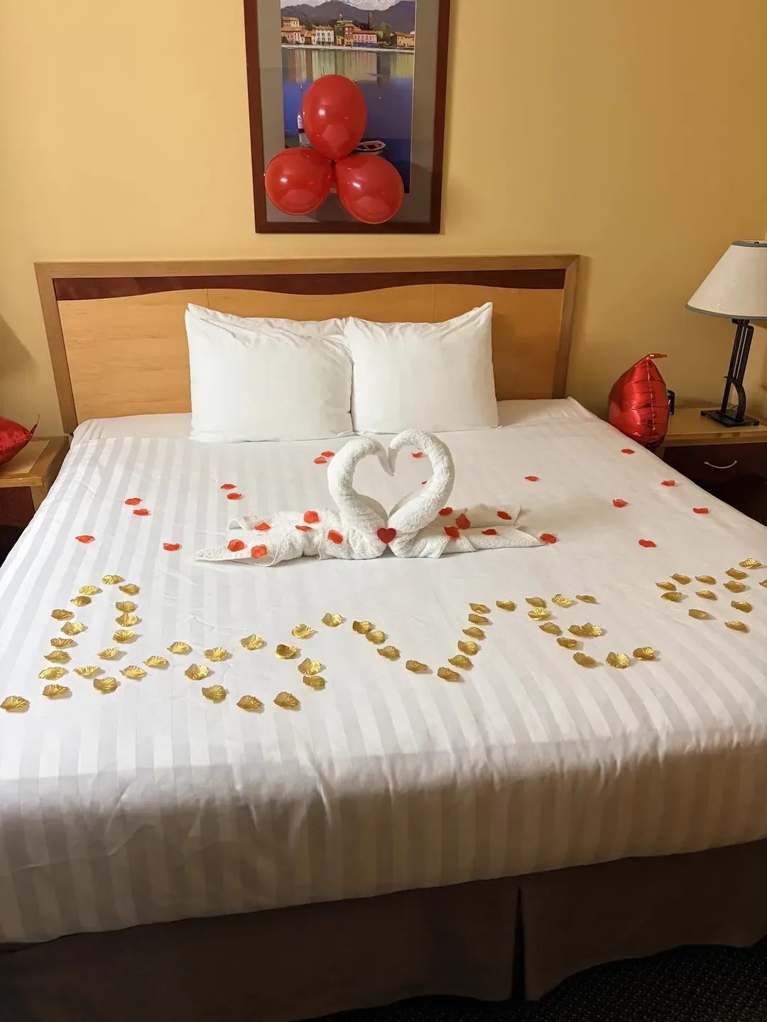 Medicine Hat Lodge, Medicine Hat — a guest room with floral bedding